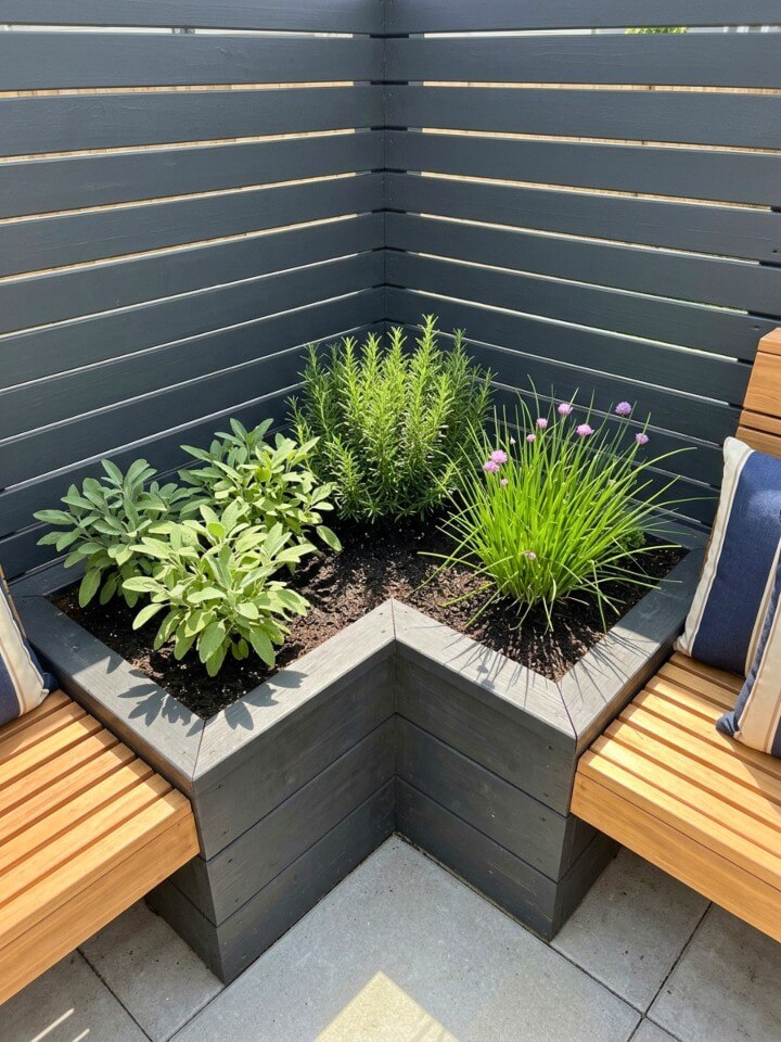 corner herb planter with seating area