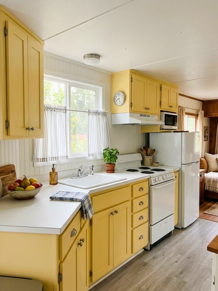 simple curtains that make the trailer kitchen feel softer