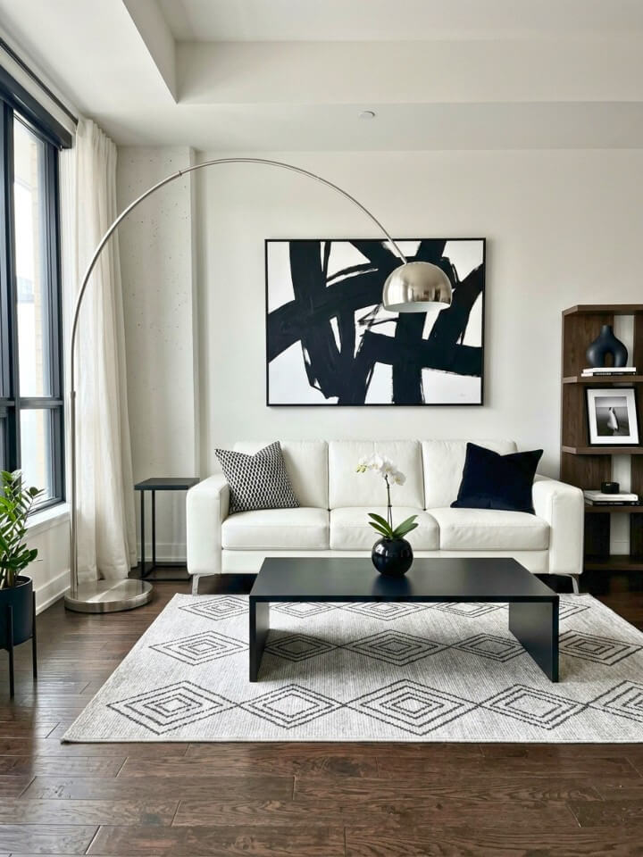 sleek black and white contrast with dark brown floors