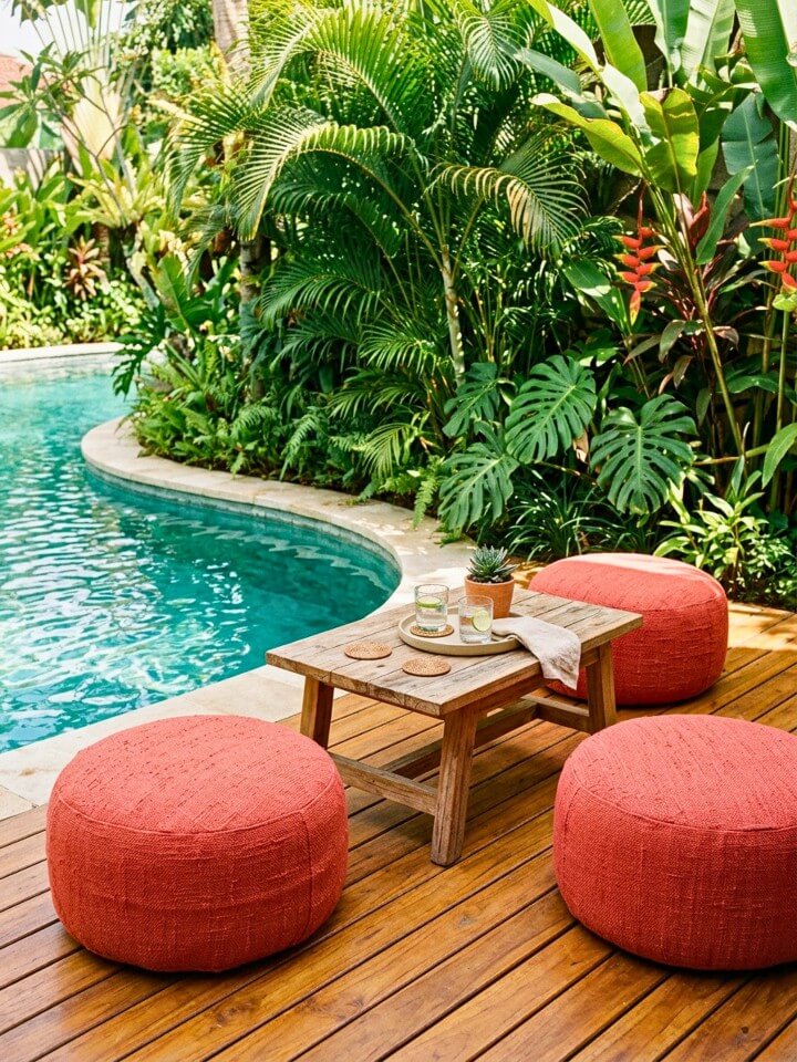 trendy outdoor poufs and ottomans as pool furniture