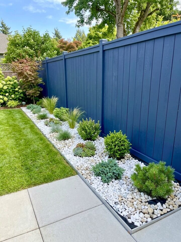 white stone border ideas for a bright fence line