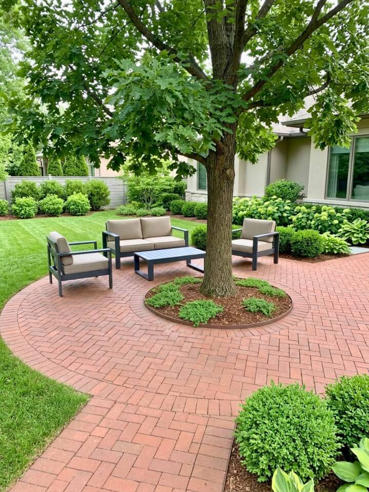 brick patio around central tree design idea