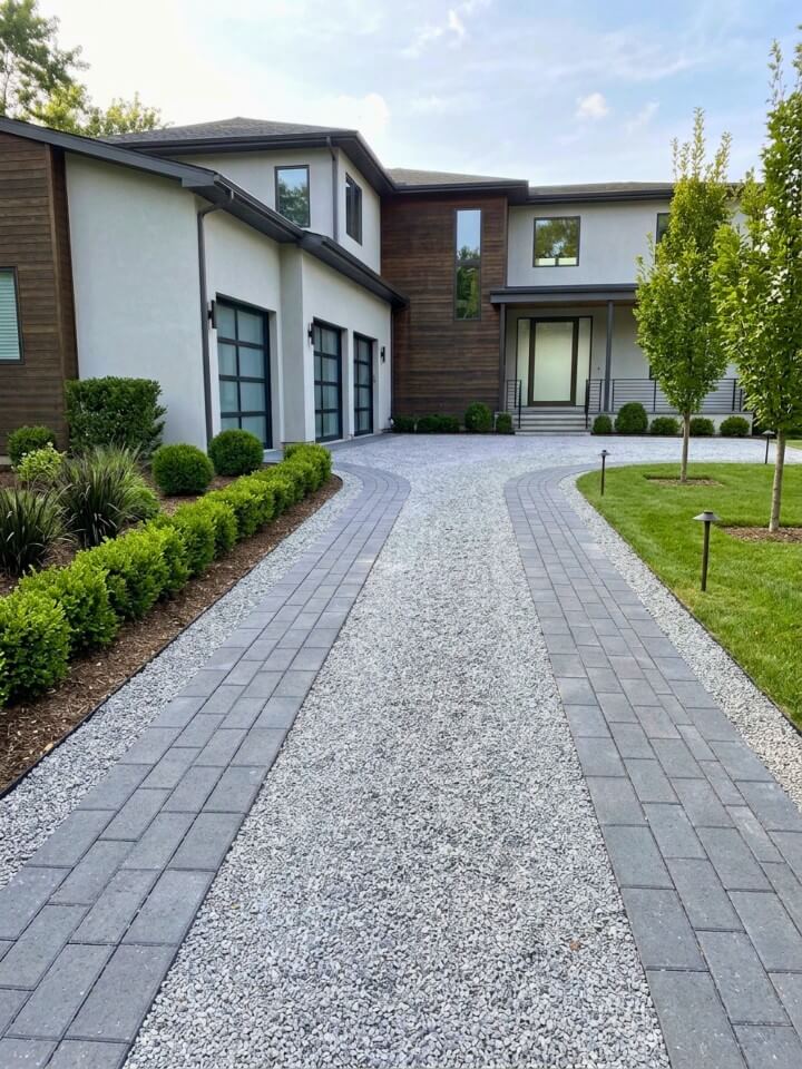 gravel and paver strip combo driveway