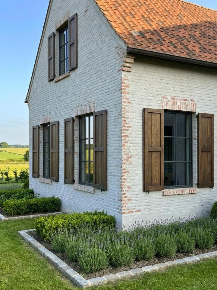 limewashed brick farmhouse exterior
